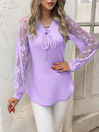 Blusa  con mangas de encaje