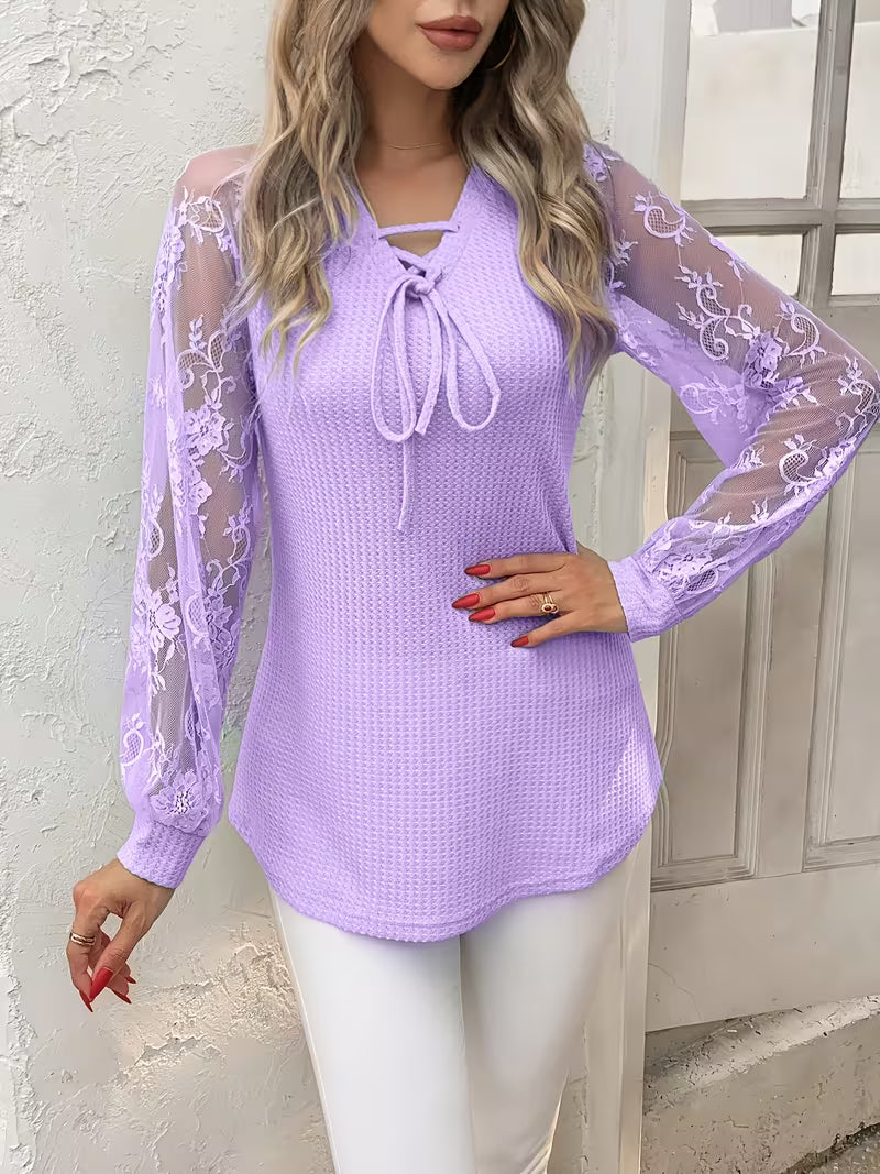 Blusa  con mangas de encaje
