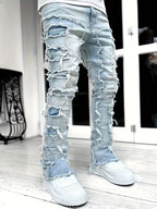 Pantalones vaqueros desgastados con efecto de capas