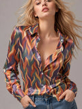 Blusa de satén «Muse Abstract»