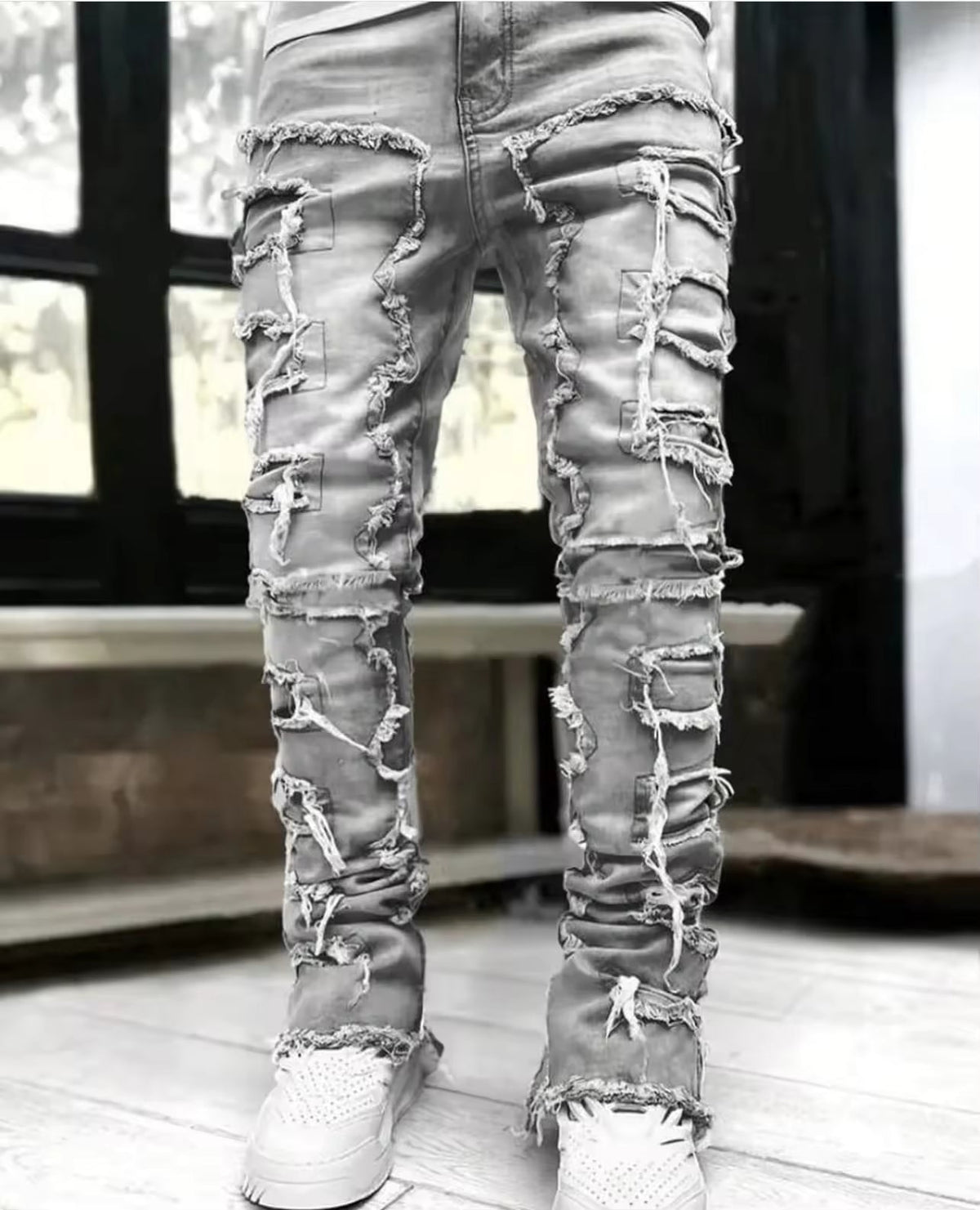 Pantalones vaqueros desgastados con efecto de capas