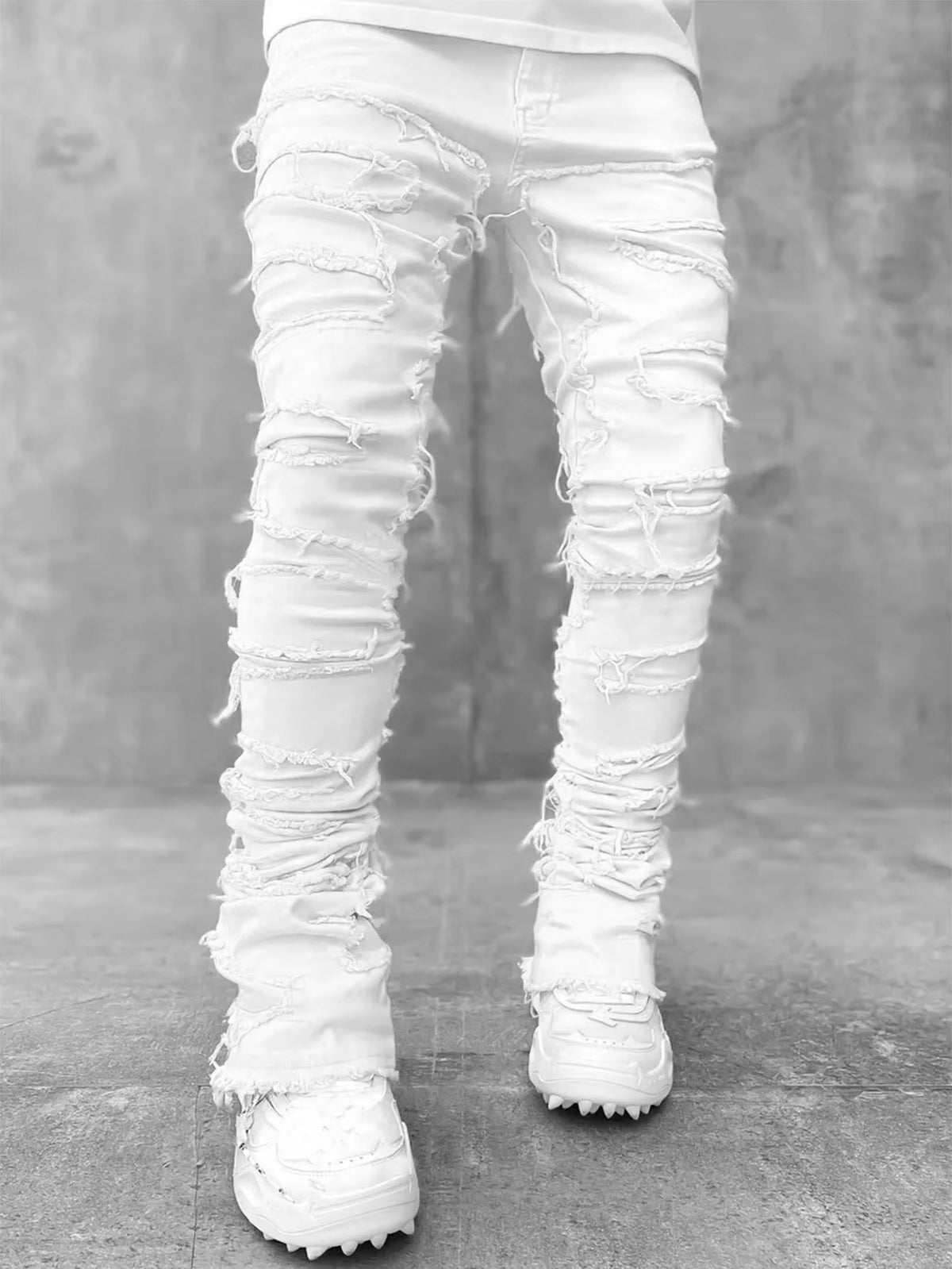 Pantalones vaqueros desgastados con efecto de capas