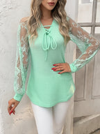 Blusa  con mangas de encaje