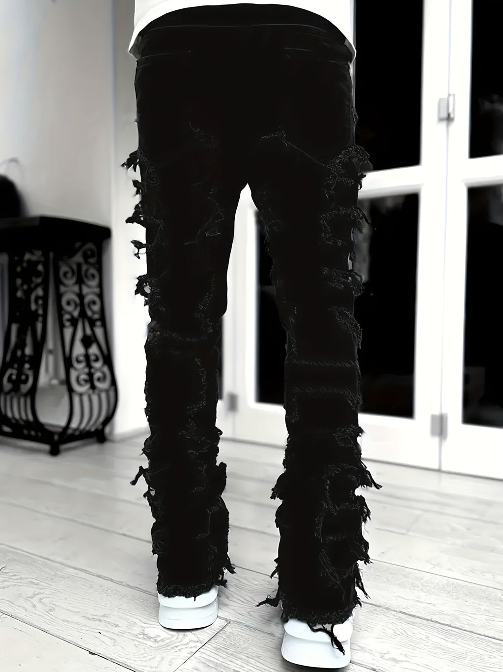 Pantalones vaqueros desgastados con efecto de capas