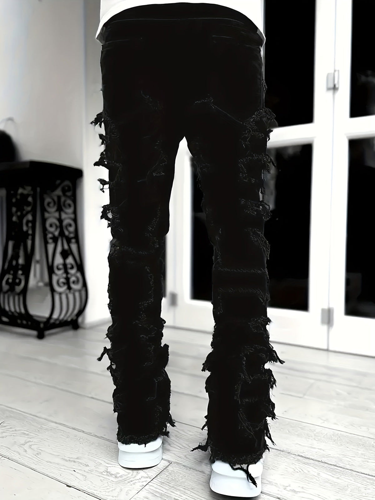 Pantalones vaqueros desgastados con efecto de capas