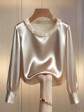 Blusa de satén