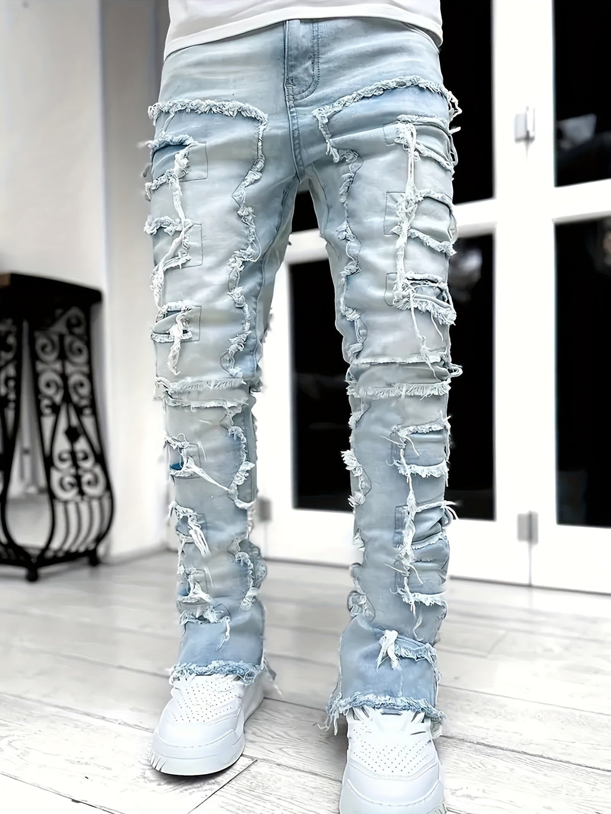 Pantalones vaqueros desgastados con efecto de capas