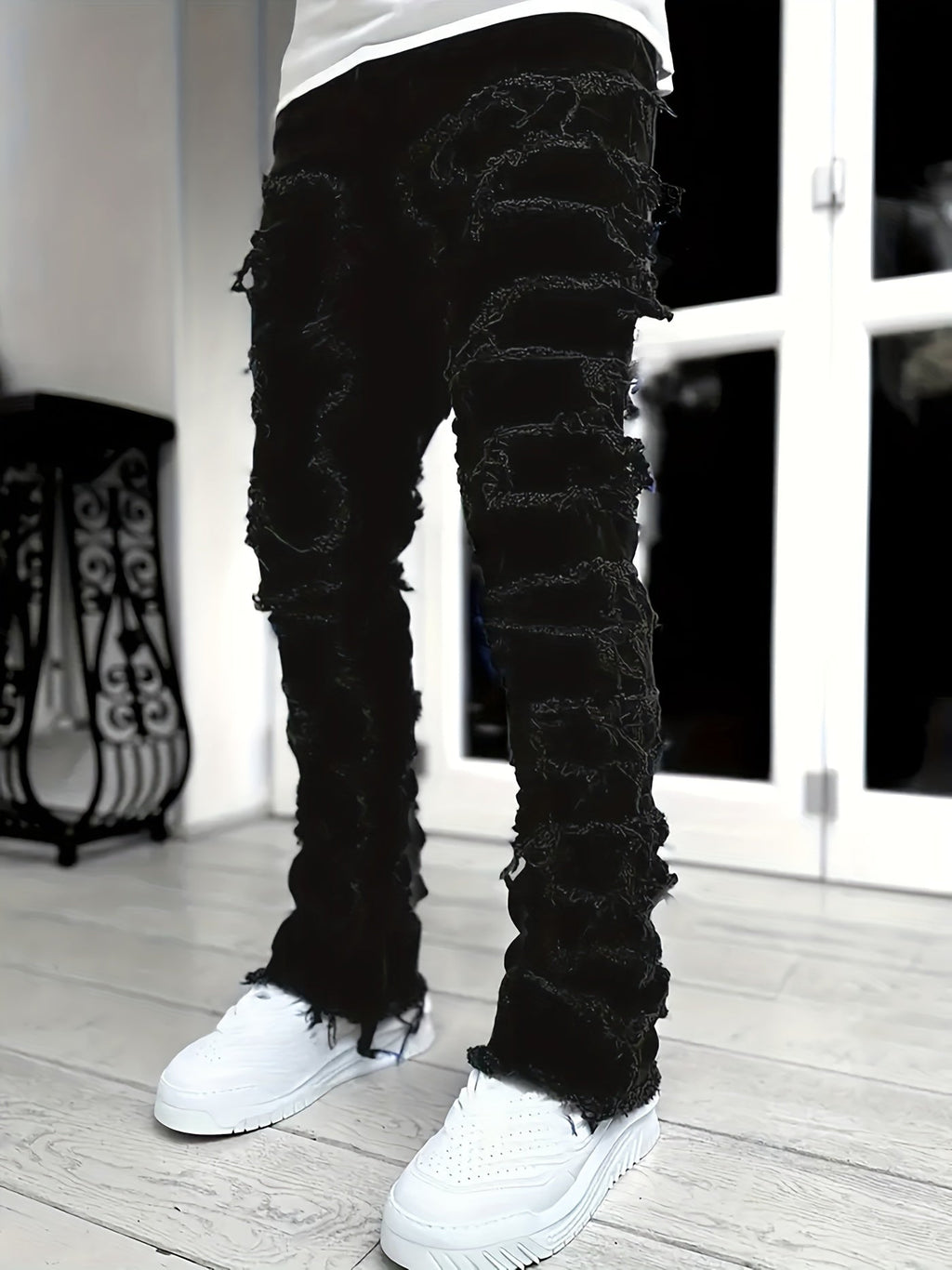Pantalones vaqueros desgastados con efecto de capas