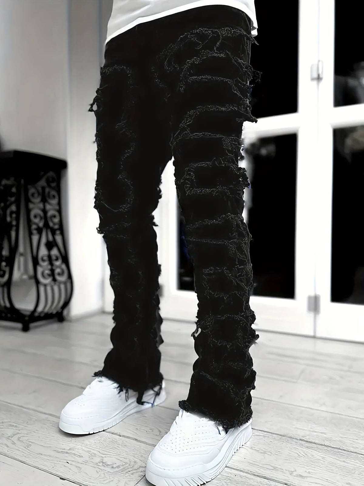 Pantalones vaqueros desgastados con efecto de capas
