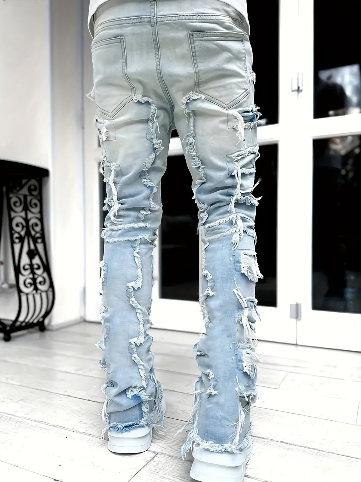Pantalones vaqueros desgastados con efecto de capas