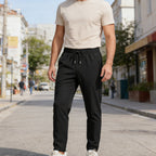 Pantalón deportivo ligero para hombre con bolsillos de cremallera