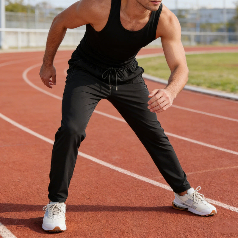 Pantalón deportivo ligero para hombre con bolsillos de cremallera